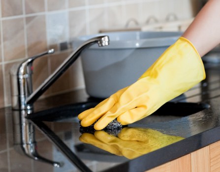 Airbnb cleaning checklist in a short-term rental living room