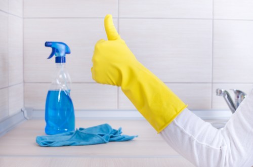 Sanitising high-touch surfaces in a shared building space